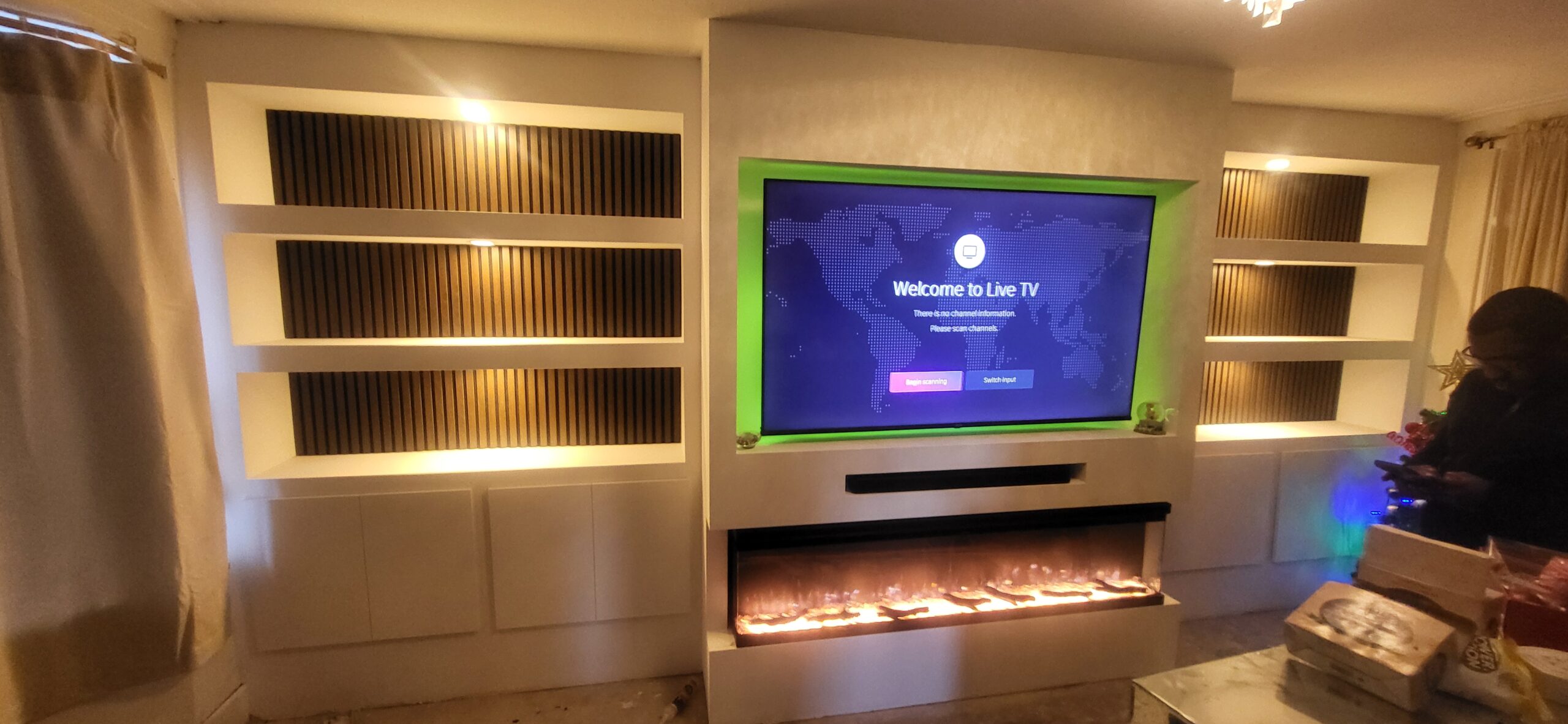 Full-Width Fireplace Media Wall With Slat Panels